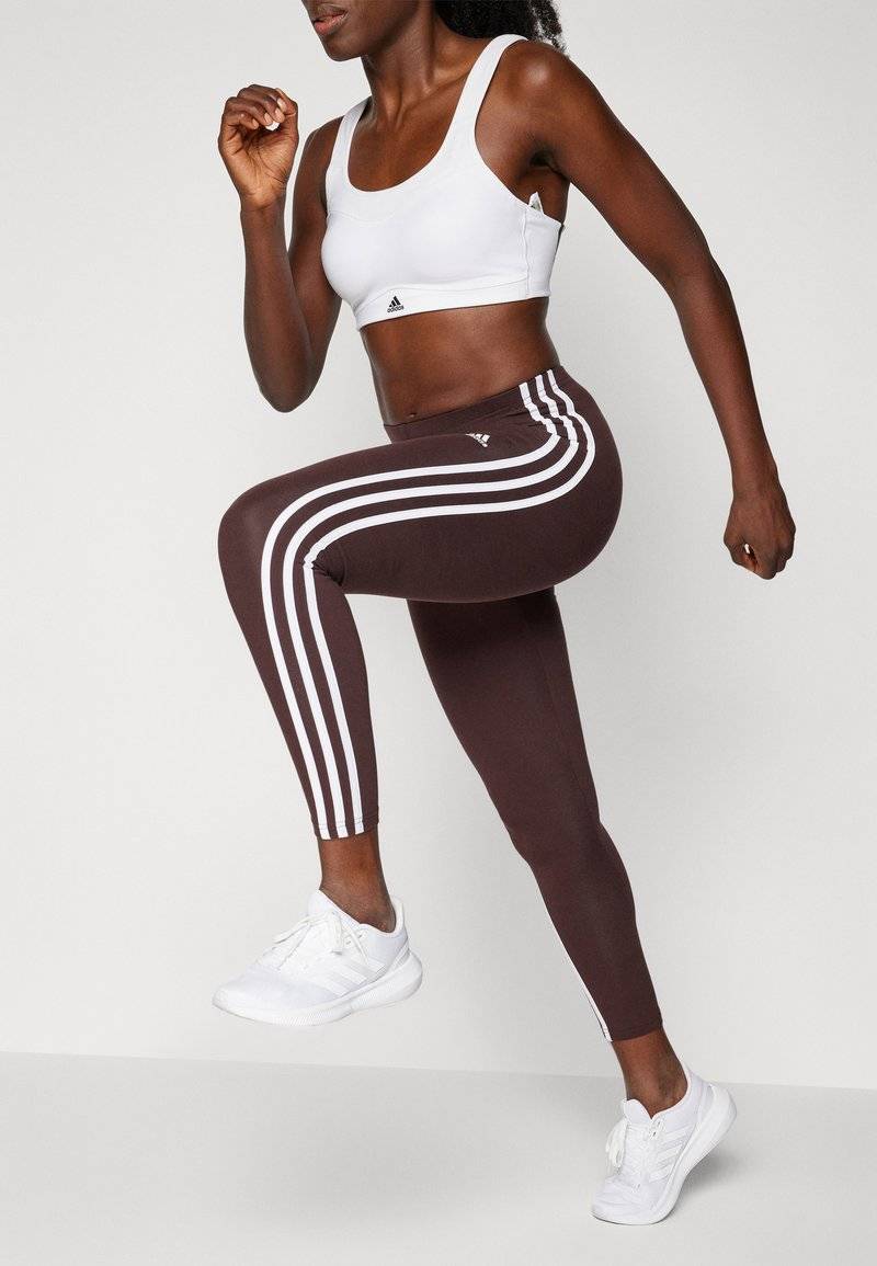 adidas Sportswear adidas Sportswear ESSENTIALS 3 STRIPES HIGH WAISTED - Leggings - shadow brown Black Friday