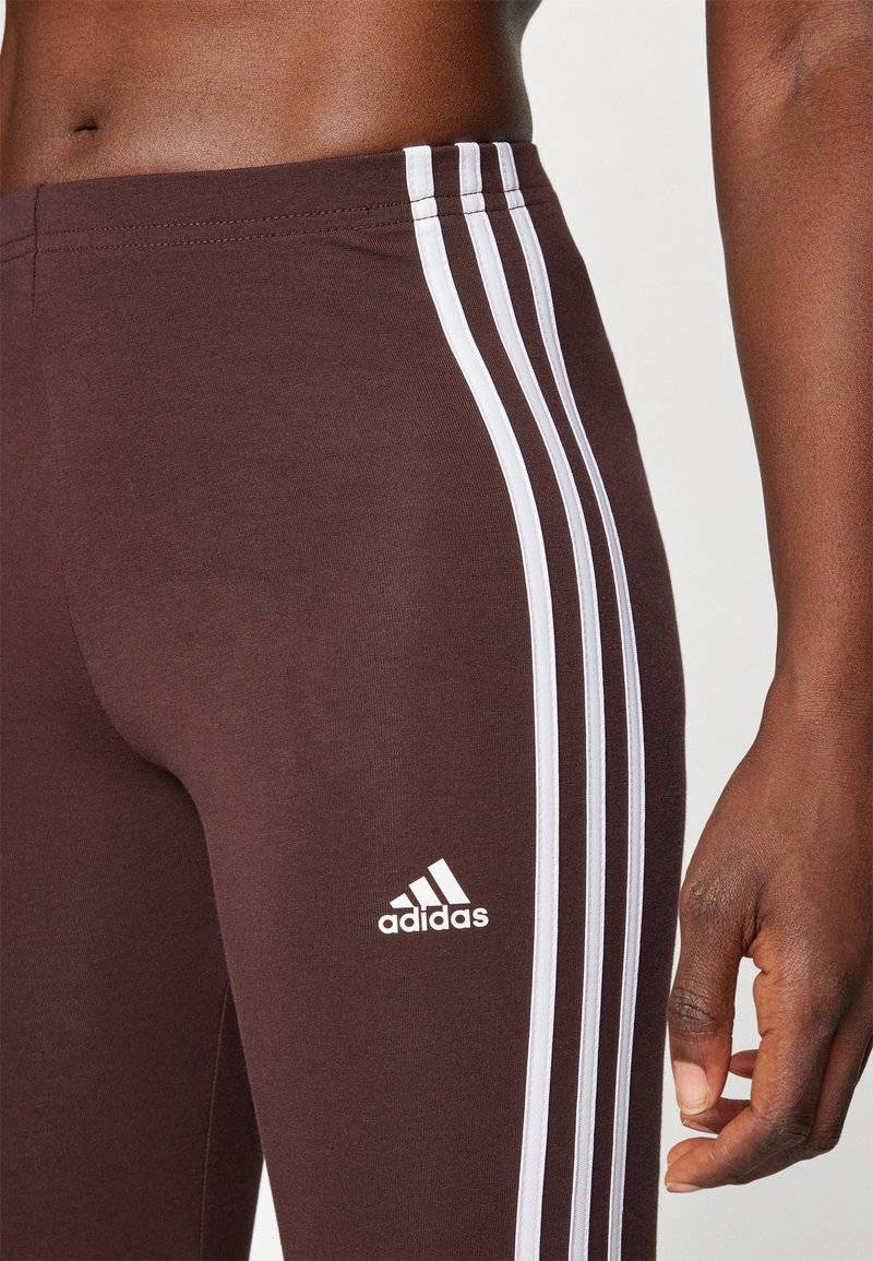 adidas Sportswear adidas Sportswear ESSENTIALS 3 STRIPES HIGH WAISTED - Leggings - shadow brown Black Friday
