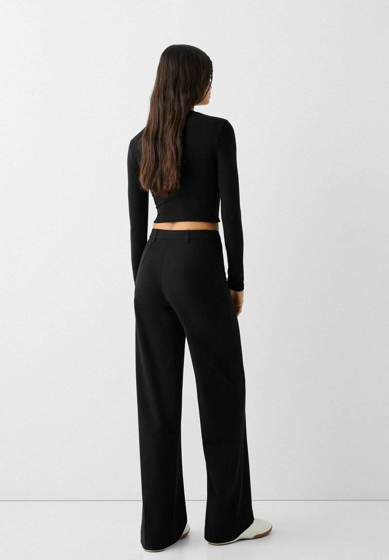 Bershka Bershka WIDE TAILORED - Trousers - black Kauf eins, bekomm eins gratis