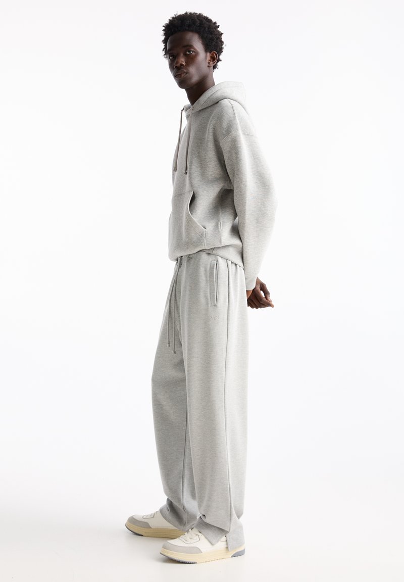 PULL&BEAR PULL&BEAR WIDE JOGGERS - Tracksuit bottoms - light grey Riesige Rabatte
