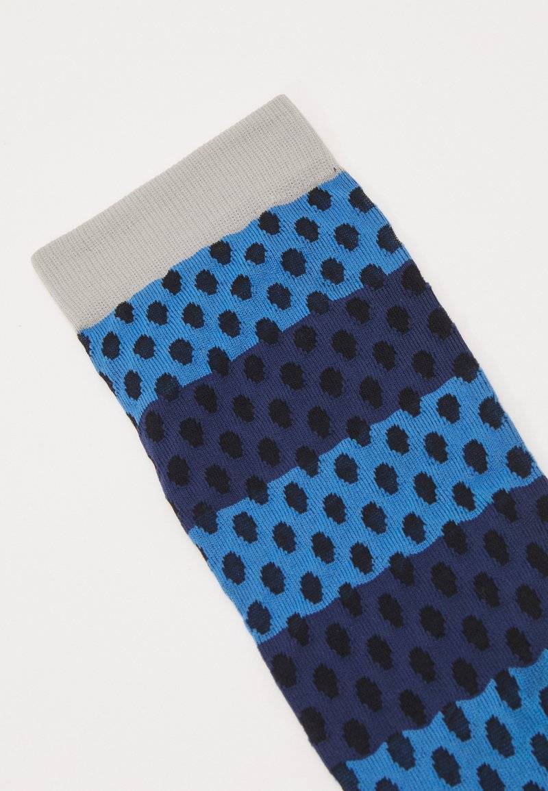 Henrik Vibskov Henrik Vibskov DOT DOT FEMME - Socks - transparent blue Osterangebot