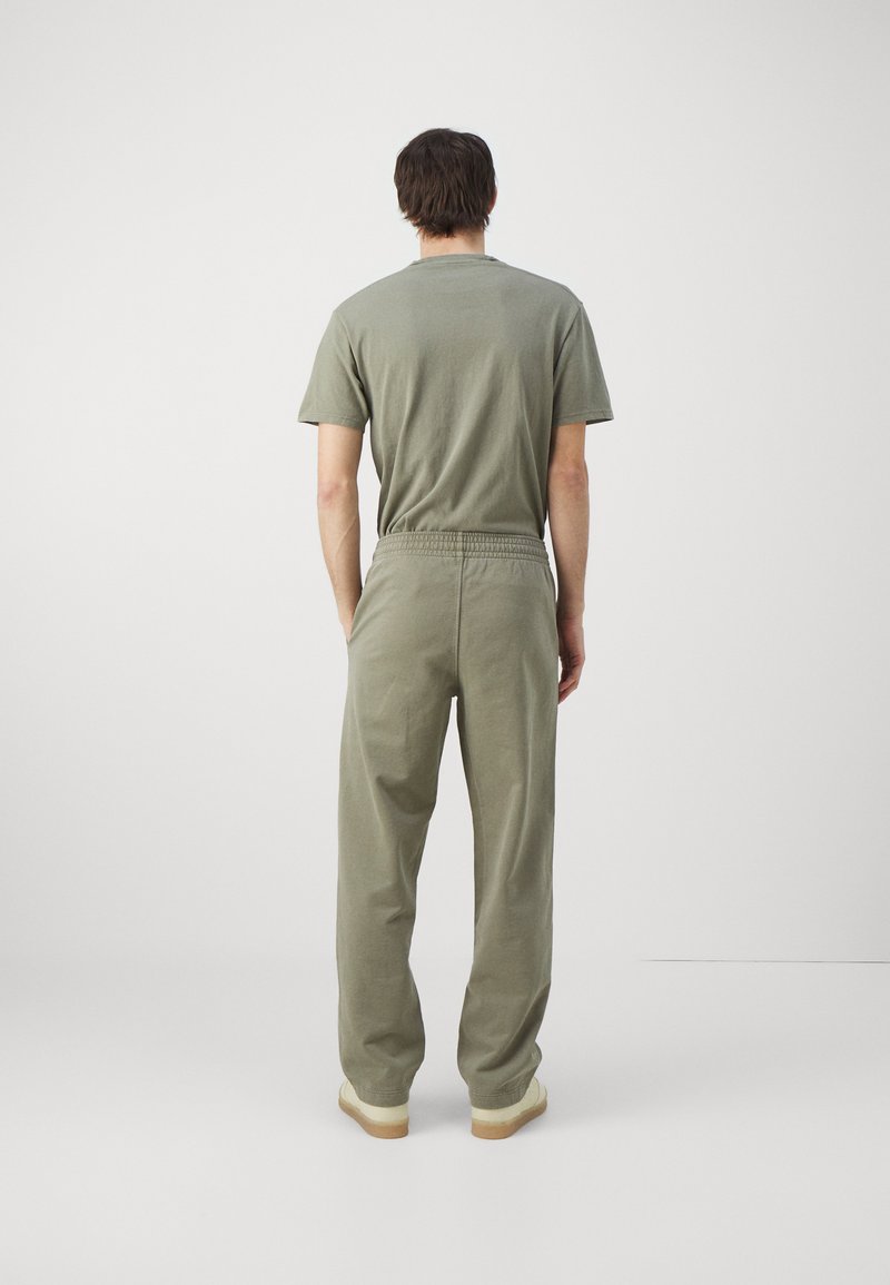 Holzweiler Holzweiler LAGOON OSLO TROUSERS UNISEX - Tracksuit bottoms - green Bestseller