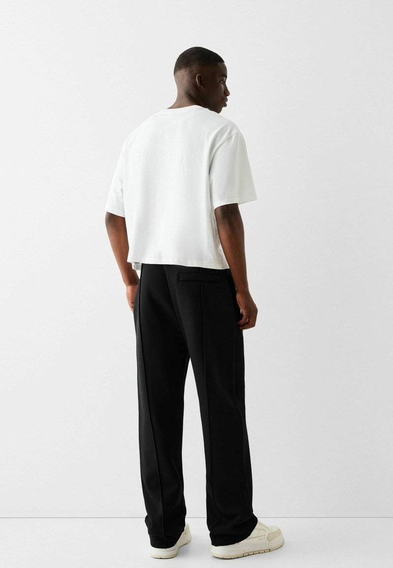 Bershka Bershka WIDE - Tracksuit bottoms - black Riesige Rabatte