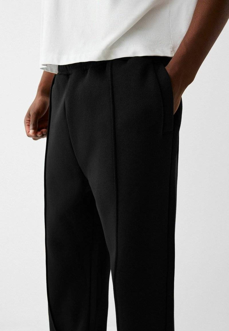 Bershka Bershka WIDE - Tracksuit bottoms - black Riesige Rabatte