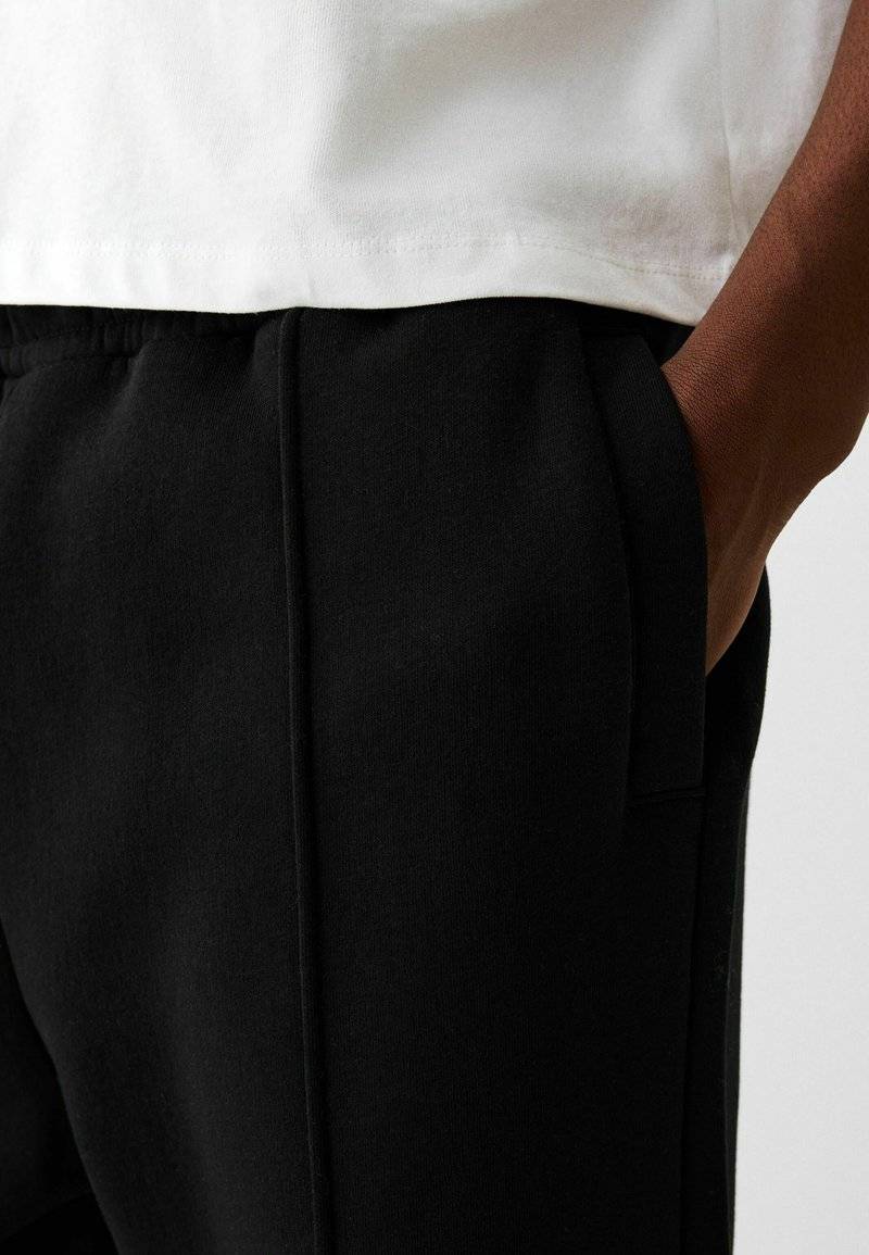 Bershka Bershka WIDE - Tracksuit bottoms - black Riesige Rabatte