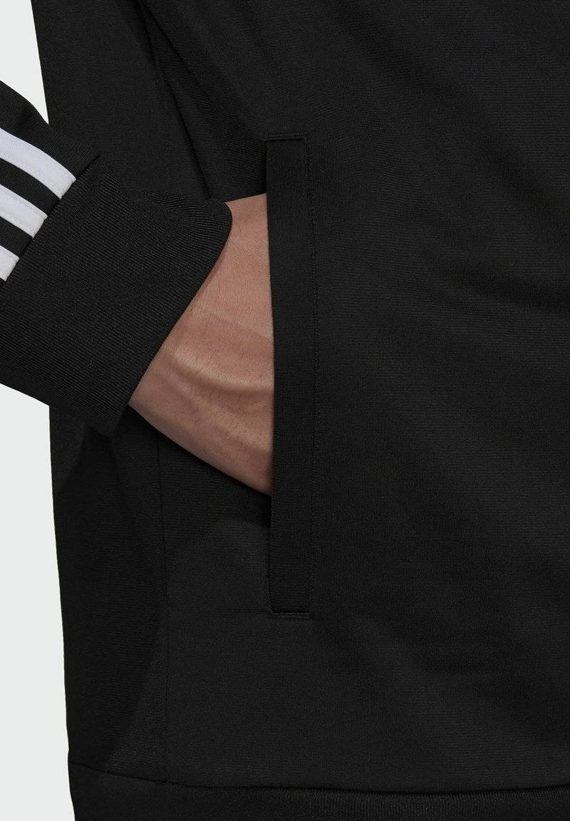 adidas Sportswear adidas Sportswear ESSENTIALS WARM-UP REGULAR 3-STRIPES - Training jacket - black Lagerräumung