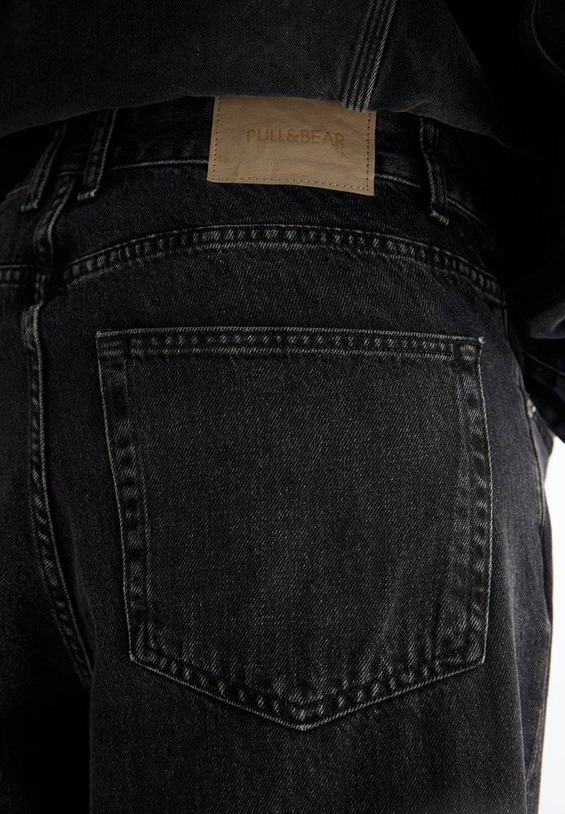 PULL&BEAR PULL&BEAR BAGGY FIT - Straight leg jeans - black Nur noch ein Tag übrig