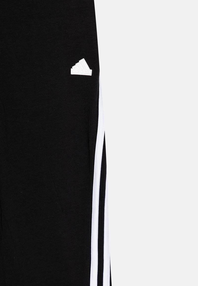adidas Performance adidas Performance FUTURE ICON 3-STRIPES FLARED - Tracksuit bottoms Neueste Mode
