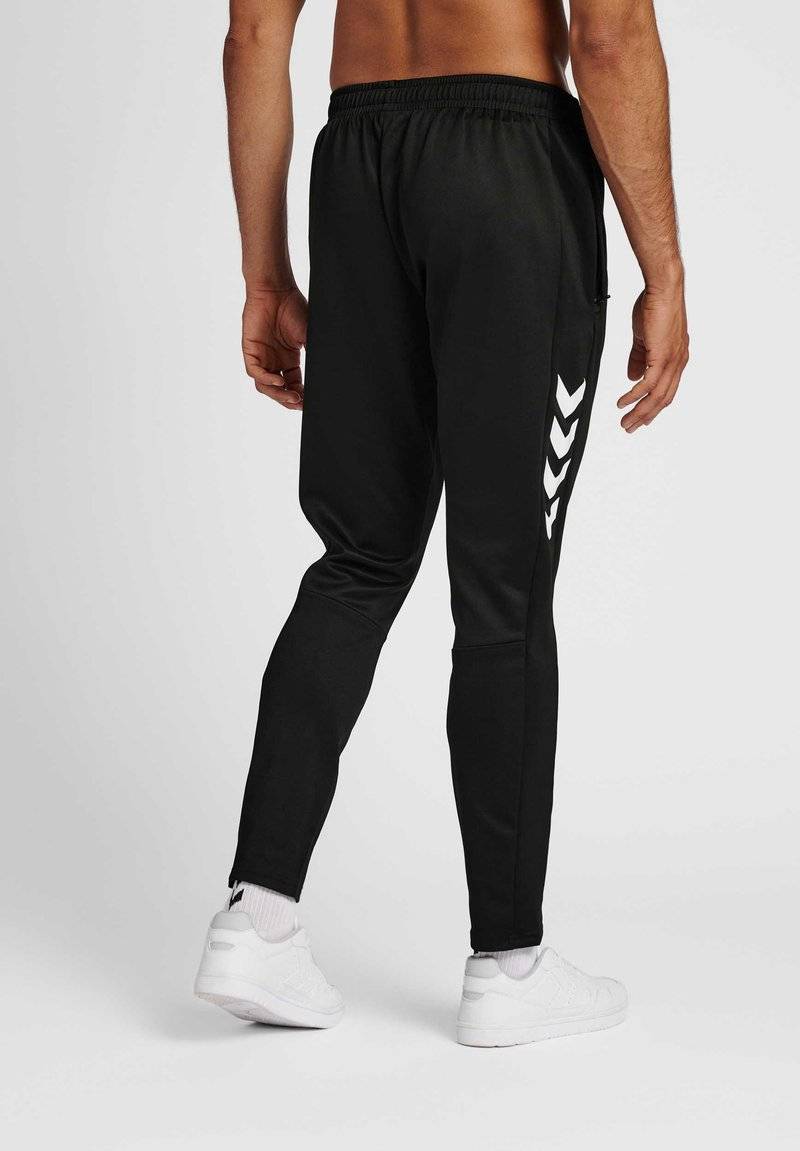 Hummel Hummel CORE XR TRAINING PANTS - Tracksuit bottoms - black zollfrei