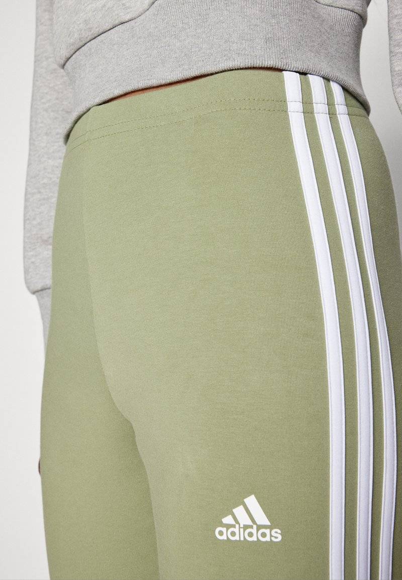 adidas Sportswear adidas Sportswear ESSENTIALS 3 STRIPES HIGH WAISTED - Leggings - tent green Online