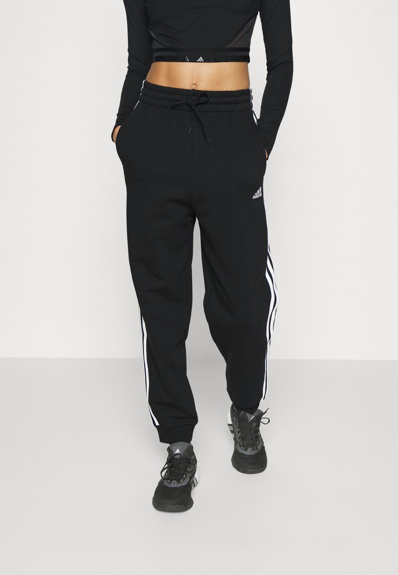 adidas Sportswear adidas Sportswear ESSENTIALS 3-STRIPES LOOSE-FIT - Tracksuit bottoms Günstiger Verkauf