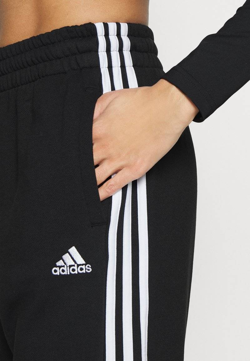 adidas Sportswear adidas Sportswear ESSENTIALS 3-STRIPES LOOSE-FIT - Tracksuit bottoms Günstiger Verkauf