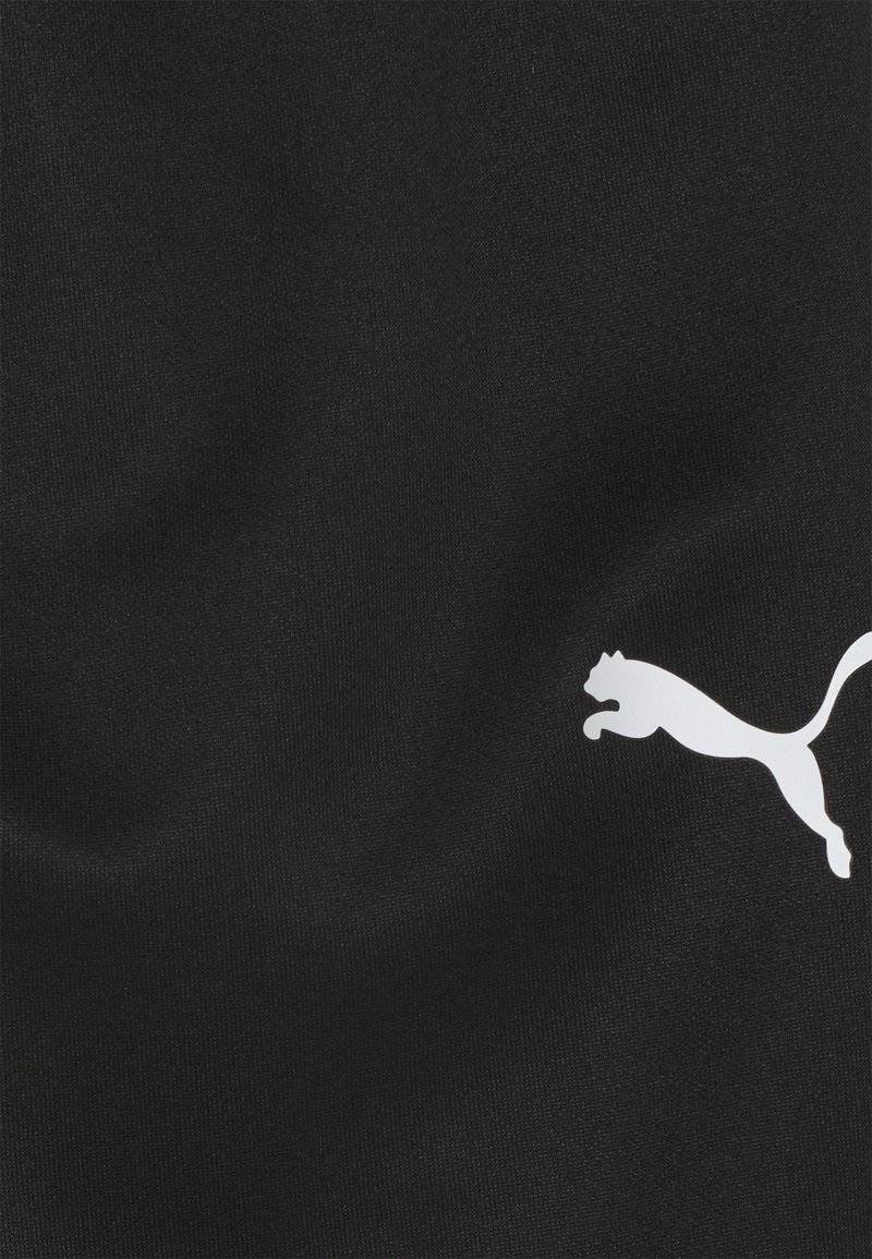 Puma Puma TEAMRISE POLY TRAINING UNISEX - Tracksuit bottoms Günstig kaufen