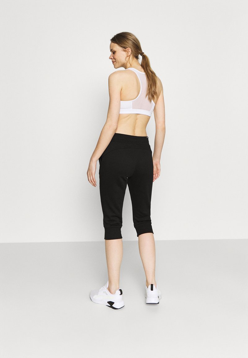 Puma Puma CAPRI - 3/4 sports trousers - black Bis zu 65% Rabatt