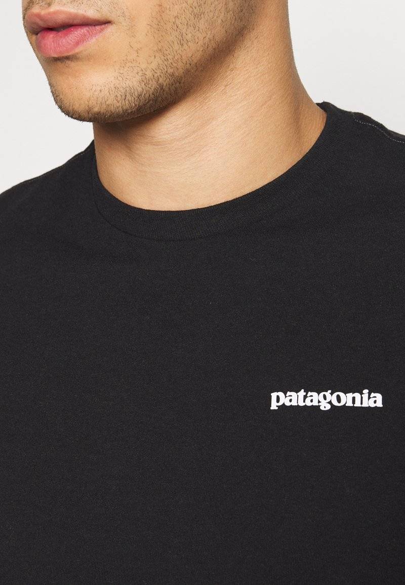 Patagonia Patagonia LOGO TEE - Print T-shirt - black Clearance-Verkauf