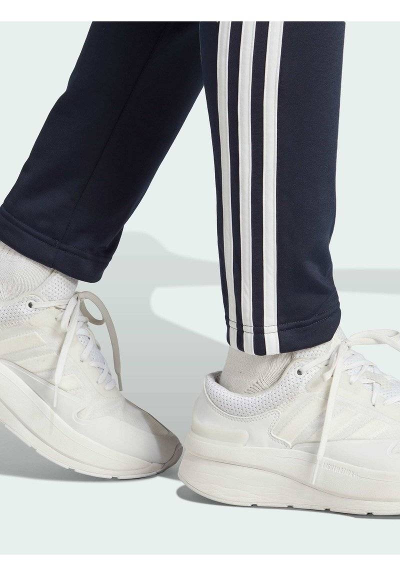 adidas Sportswear adidas Sportswear ESSENTIALS 3-STRIPES - Tracksuit - legend ink white Fabrikladen