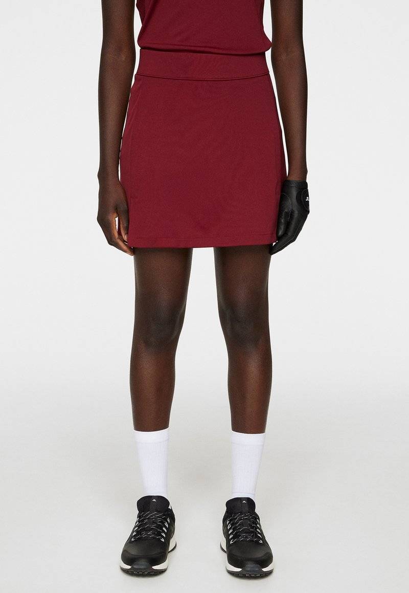 J.LINDEBERG Sports J.LINDEBERG Sports AMELIE MID - Sports skirt - cabernet Versandkostenfrei