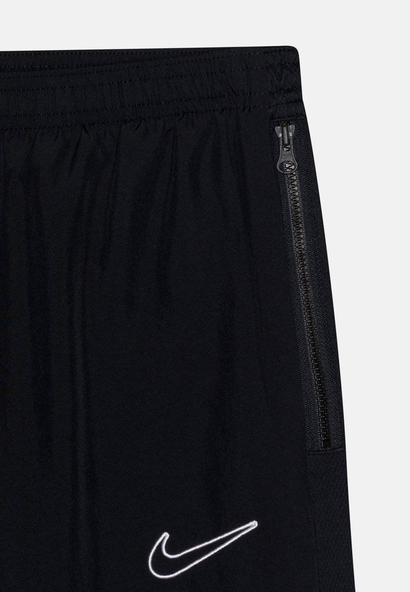 Nike Performance Nike Performance ACADEMY 23 TRACK PANT UNISEX - Tracksuit bottoms Lagerräumung