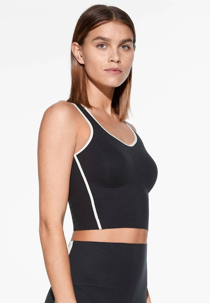 OYSHO OYSHO PERFECT-ADAPT PIPING - Sports T-shirt - black Preisnachlass