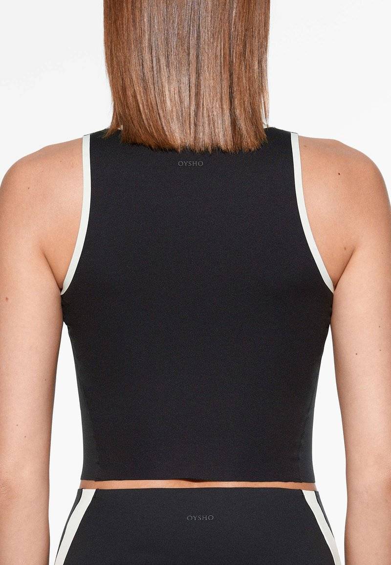 OYSHO OYSHO PERFECT-ADAPT PIPING - Sports T-shirt - black Preisnachlass