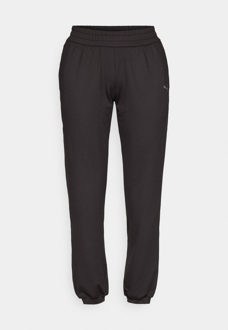 Puma Puma STUDIO FOUNDATIONS - Tracksuit bottoms - black Begrenzt auf 3 Tage