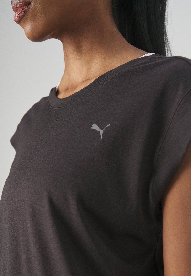 Puma Puma STUDIO FOUNDATIONS TEE - Sports T-shirt - black Speichern exportieren