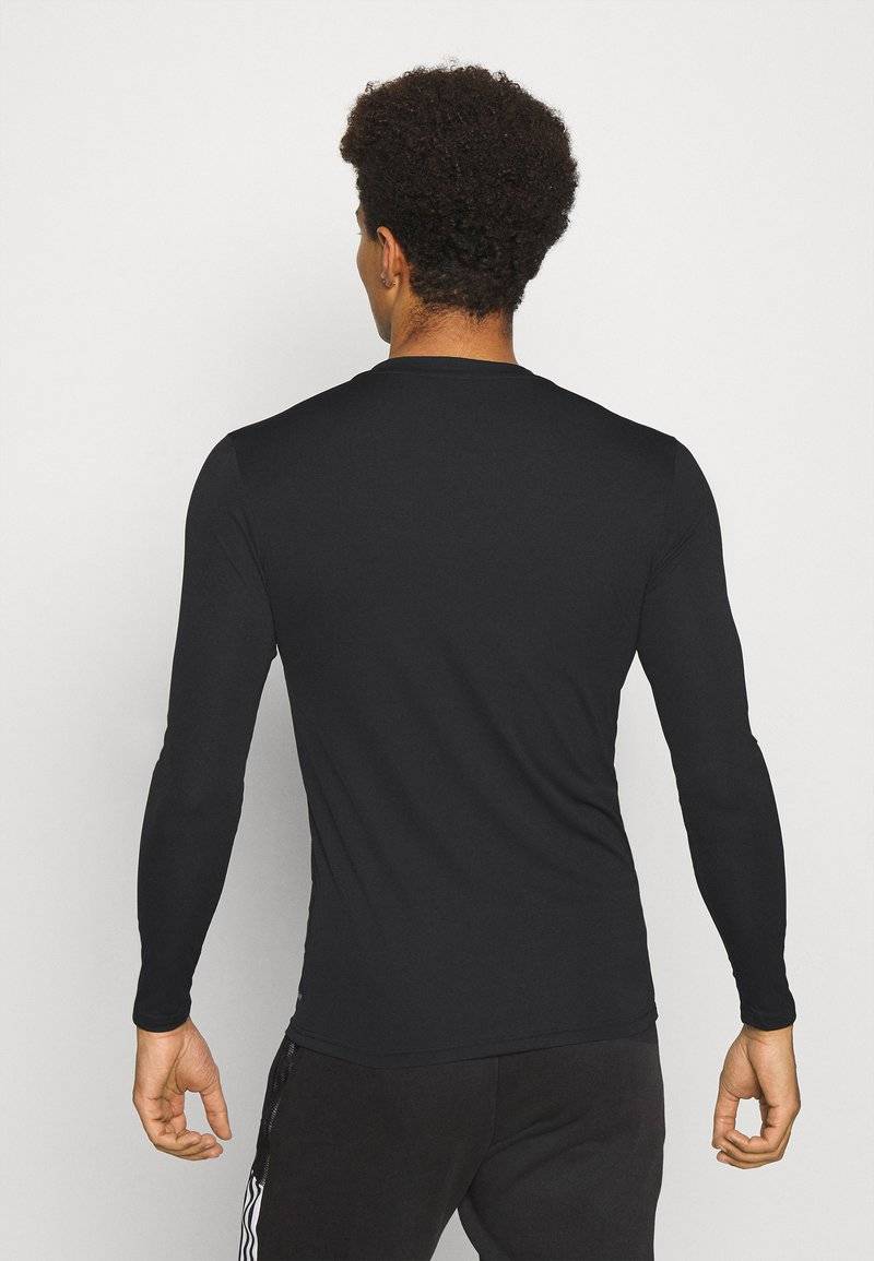 adidas Performance adidas Performance TEAM BASE TEE - Undershirt - black Begrenztes Angebot