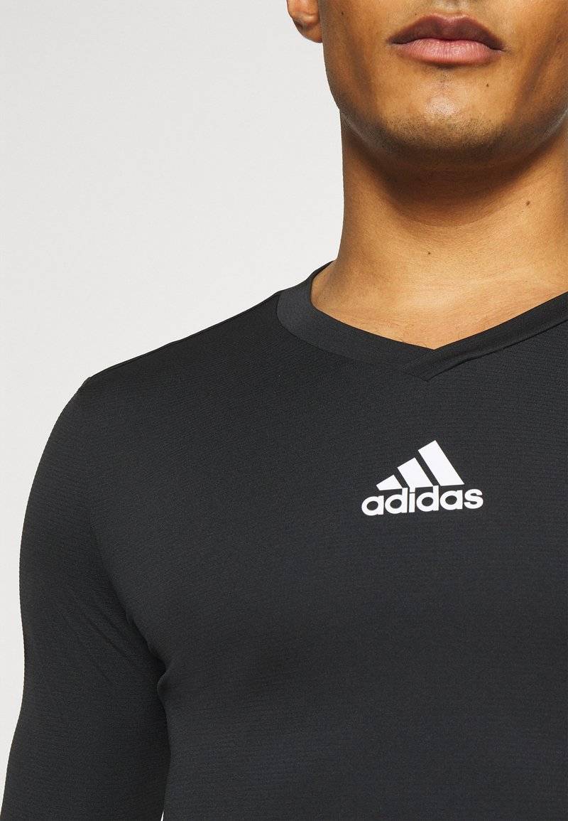 adidas Performance adidas Performance TEAM BASE TEE - Undershirt - black Begrenztes Angebot