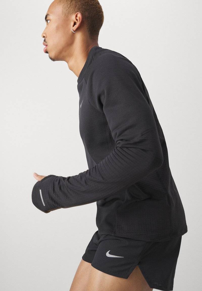 Nike Performance Nike Performance FAST SHORT - Sports shorts Neuheiten