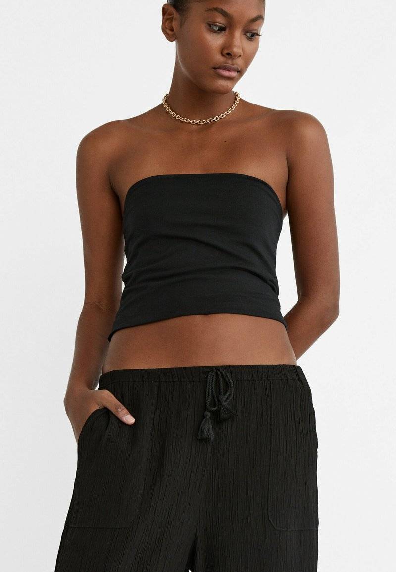 Stradivarius Stradivarius FLOWING CULOTTES - Trousers - black 50% Rabatt mit kostenlosem Versand