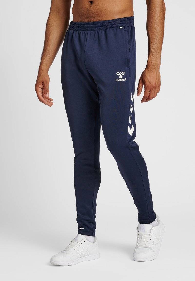 Hummel Hummel CORE XR TRAINING PANTS - Tracksuit bottoms - marine Im Verkauf