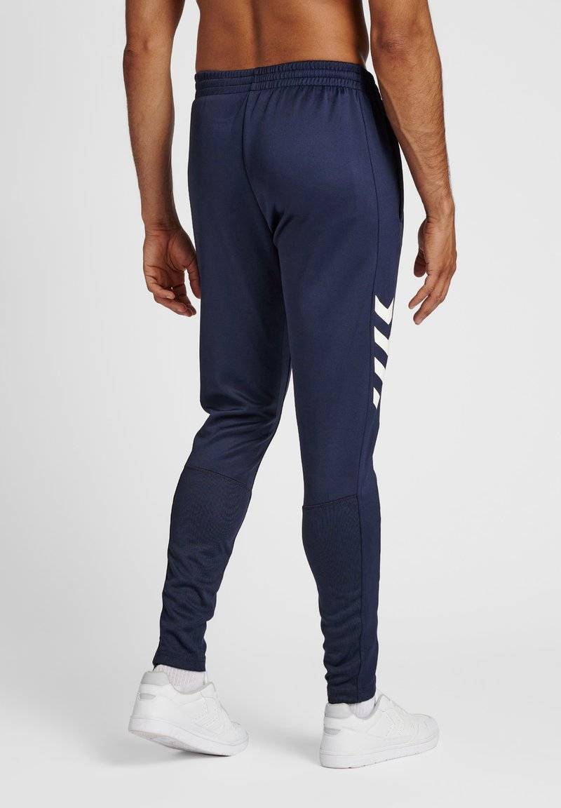 Hummel Hummel CORE XR TRAINING PANTS - Tracksuit bottoms - marine Im Verkauf