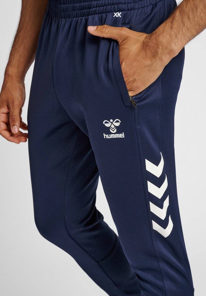 Hummel Hummel CORE XR TRAINING PANTS - Tracksuit bottoms - marine Im Verkauf