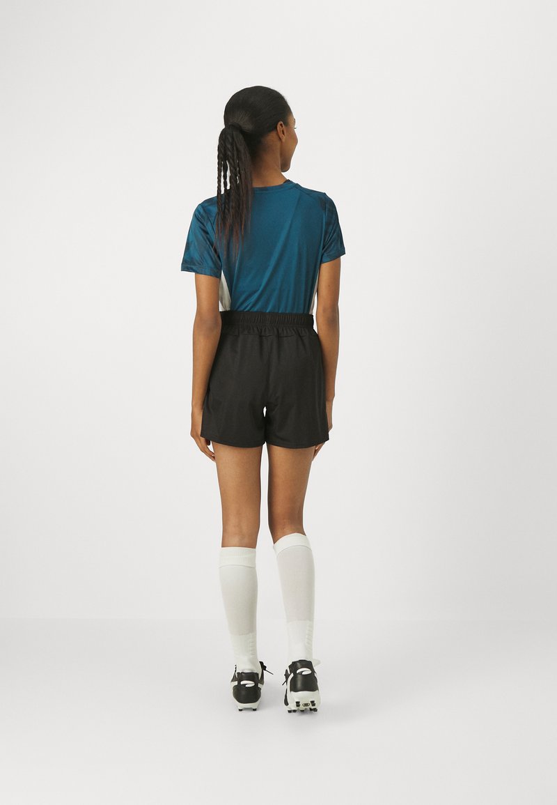 Puma Puma TEAMGOAL SHORTS - Sports shorts - black Rabatte dieses Monats