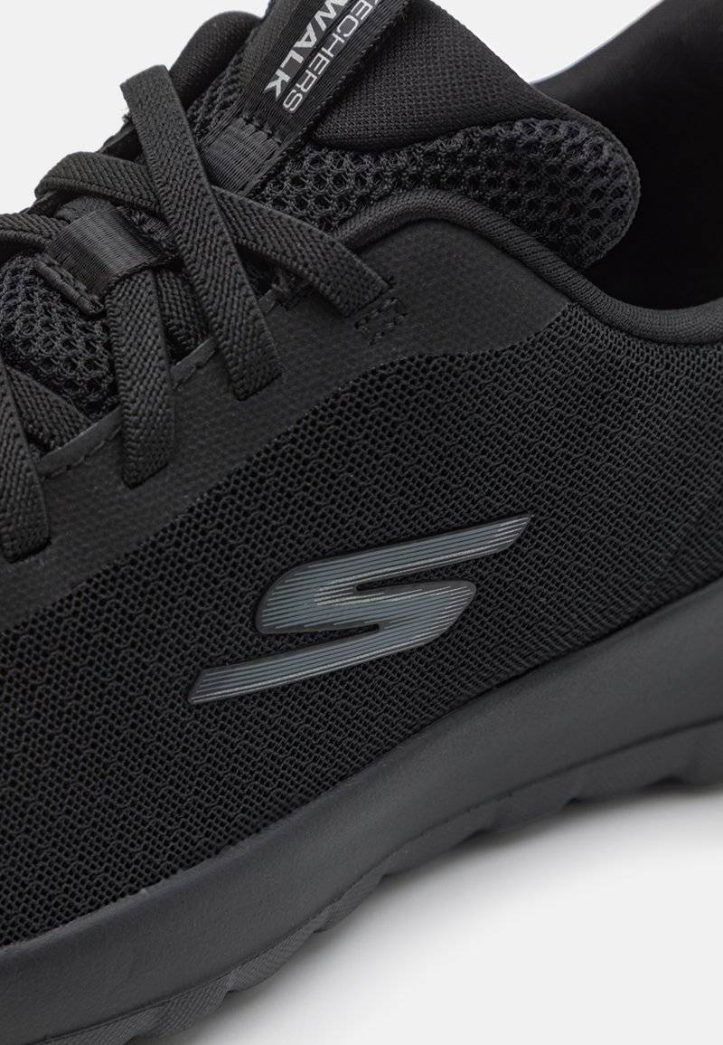 Skechers Performance Skechers Performance GO WALK BUNGEE - Walking trainers - black Outlet